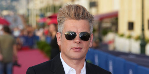 French singer and actor Benjamin Biolay was seen wearing gunmetal Ray-Ban Caravan 3136 004 sunglasses at the Cabourg Film Festival 2022. Shop online now on Pretavoir