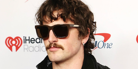 Benson Boone was seen wearing brown Emporio Armani EA4262U 6307/73 square sunglasses at the 2026 iHeartRadio Music Festival in Las Vegas.