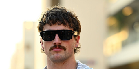 Benson Boone was seen wearing black Ray-Ban Flacko RB 4454 6677/48 Polarised sunglasses at the F1 Grand Prix of Abu Dhabi 2025.