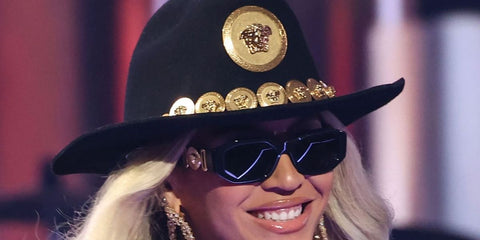 Beyoncé is wearing Versace 4361 GB1/87 Medusa Biggie Sunglasses on stage at the 2024 iHeartRadio Music Awards to accept the Innovator Award