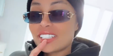 Blac Chyna was seen wearing gold Cartier CT0468S 002 rimless sunglasses with blue lenses in her Instagram reel