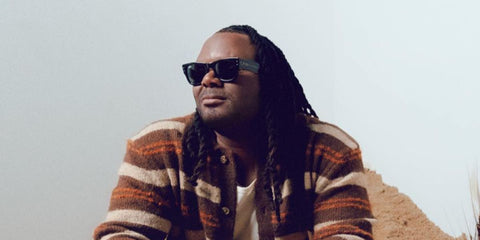 Singer-songwriter Blessing Offor of The Voice was seen wearing black Ray-Ban Mega Wayfarer RB 0840S 901/31 sunglasses in his Facebook profile photo.