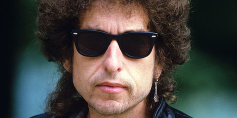 Bob Dylan was seen wearing Ray-Ban Wayfarer 2140 901 Black sunglasses