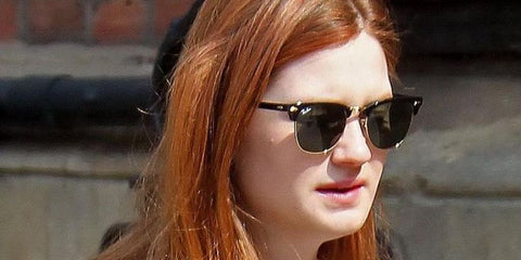 Bonnie Wright was seen wearing the iconic Ray-Ban Clubmaster 3016 W0365 Black half-rim sunglasses