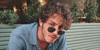 Turkish actor Boran Kuzum was seen wearing Ray-Ban RB 3548N 001 Hexagonal Gold With Flat Lenses sunglasses in his Instagram post, July 2020.