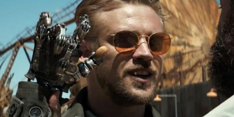 Actor Boyd Holbrook was seen wearing gold Ray-Ban Round Metal RB 3447 001/51 round sunglasses with brown lenses in Logan as Donald Pierce