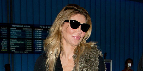 Brandi Glanville of The Rich Housewives of Beverly Hills was seen wearing black Ray-Ban Jeffrey RB 2190 901/31 sunglasses at LAX, October 2014.