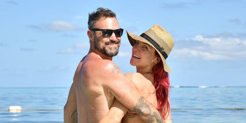 Brian Austin Green was seen wearing Ray-Ban Justin 4165 601/8G sunglasses with grey gradient lenses while on vacation with Shana Burgess