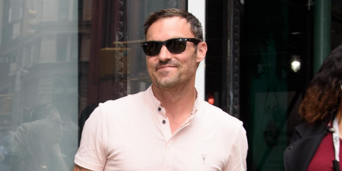 Brian Austin Green was seen wearing Ray-Ban Wayfarer 2140 901 Black sunglasses