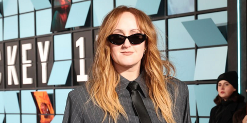 Content creator Brittany Broski was seen wearing black Prada PR 26ZS 16K08Z cat eye sunglasses at the world premiere of "Mickey 17" in London, February 2025. Shop online now on Pretavoir