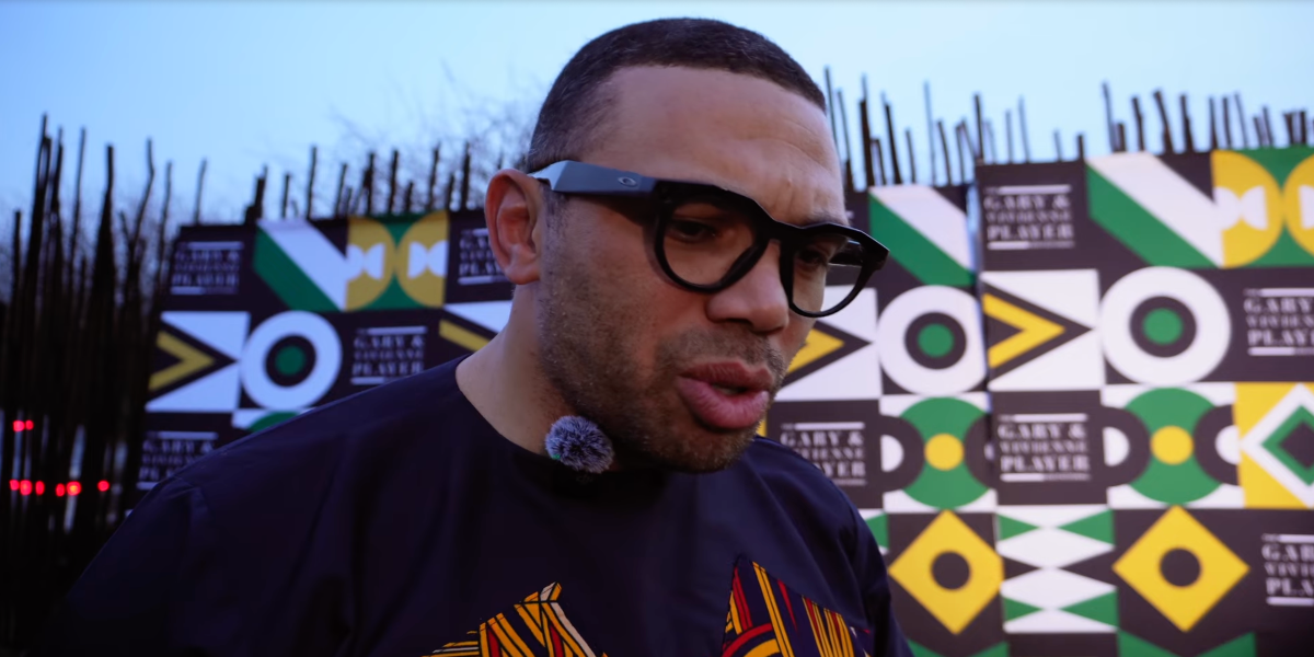 South African former rugby player Bryan Habana was seen wearing black Oakley Meta Hstn OW8002 07 Smart Glasses at Gary Player's 90th birthday in November 2025.