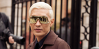 Fashion blogger Bryanboy was seen wearing gold Loewe Signature LW40193U 30G sunglasses at the Loewe Spring/Summer 2026 fashion show during Paris Fashion Week.