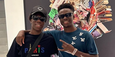 Bukayo Saka wears Prada PR 17WS 1AB5S0 Symbole Sunglasses in a social media post