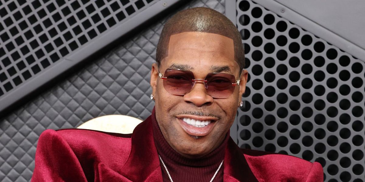 Busta Rhymes was seen wearing gold Cartier Panthere CT0549S 004 rimless sunglasses with red purple gradient lenses at the Grammy Awards 2026.