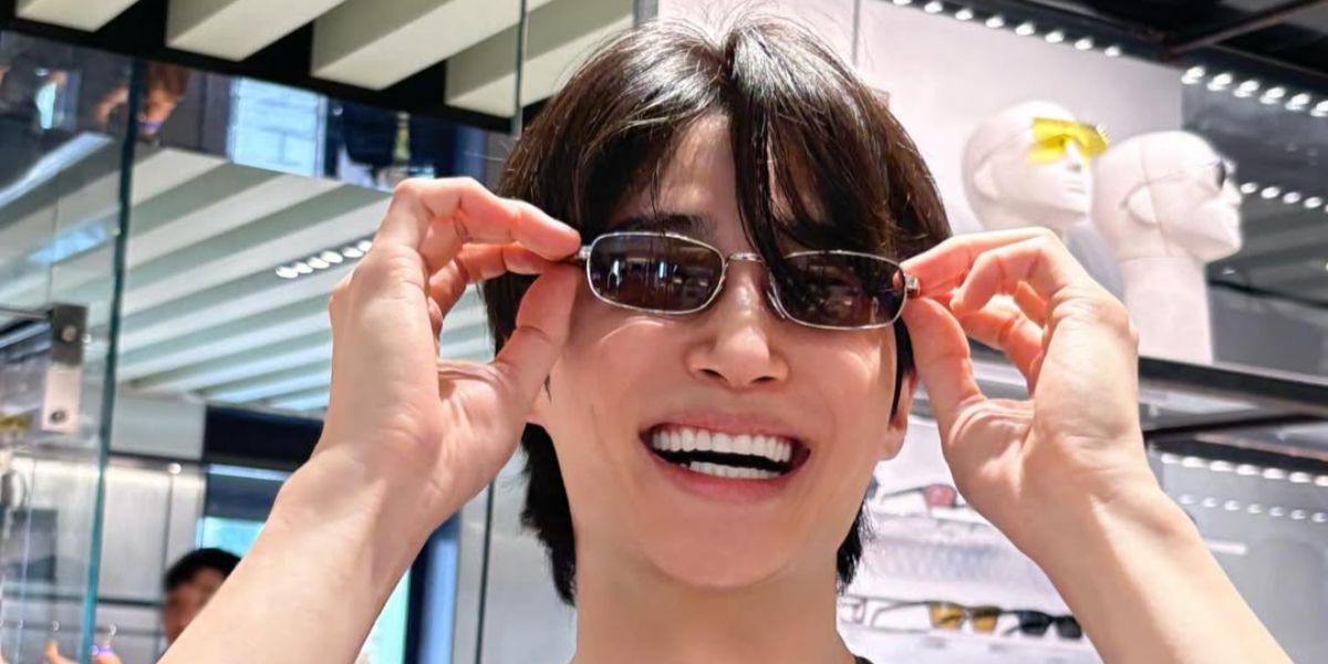 South Korean actor Byeon Woo-seok was seen wearing silver Prada PR B54S 1BC30P rectangular sunglasses during Milan Fashion Week Fall/Winter 2025.