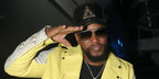 American rapper Cam'ron or Cameron Giles was seen wearing black iron Dita Mach Six DTS 121 06 sunglasses