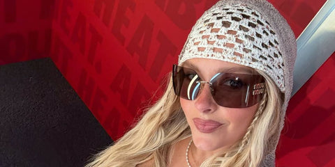 Model Camille Kostek was seen wearing Miu Miu Rimless Runway MU 54YS ZVN20F sunglasses with brown lenses at the Coachella Music Festival 2026.