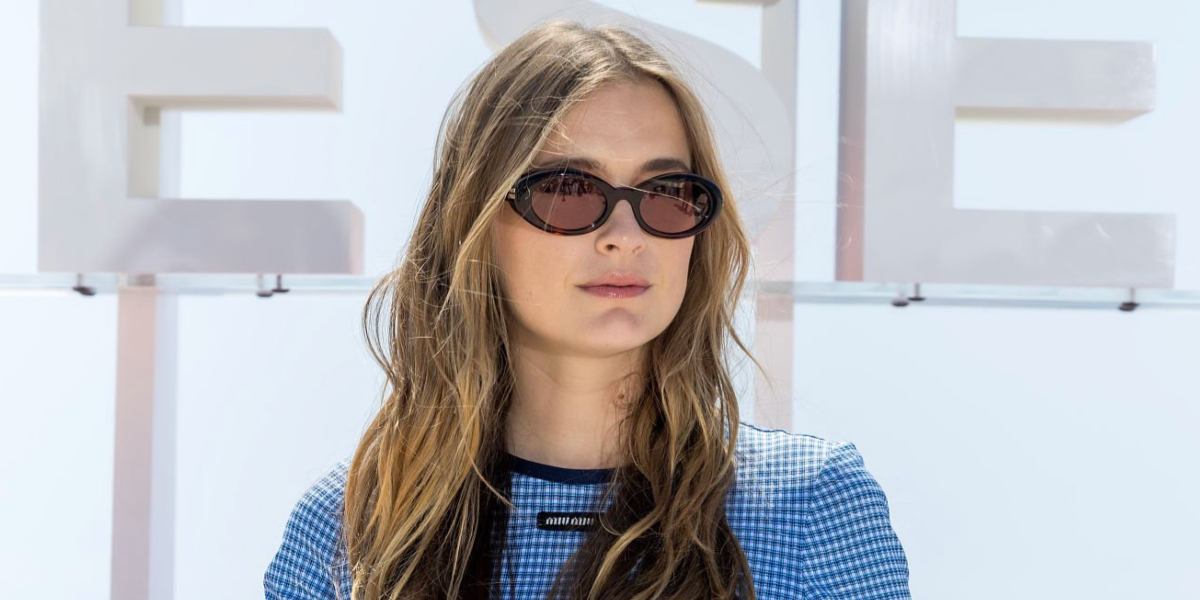 French actress Camille Razat was seen wearing tortoiseshell Miu Miu MU B09S 14L20V Reverie sunglasses at the 9th Canneseries International Festival in Cannes, April 2026.