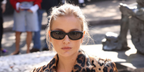 Camille Razat wore black Miu Miu MU C01S 16K80Q Ciel sunglasses at the Miu Miu Spring Summer 2027 show during Paris Fashion Week