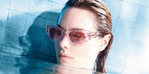 Camille Rowe was seen modeling pink transparent Gucci GG1553S 003 cat eye sunglasses with red gradient lenses in the Gucci Spring/Summer 2024 campaign