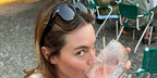 Camille Rowe was seen wearing black Persol 0086S 95/31 sunglasses in her Instagram post