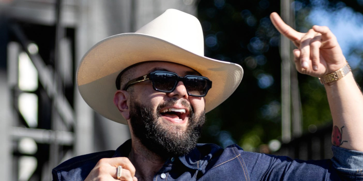 Mexican singer Carin Leon was seen wearing black Prada PR 02ZS 1AB06T sunglasses onstage at the Austin City Limits Music Festival 2024.