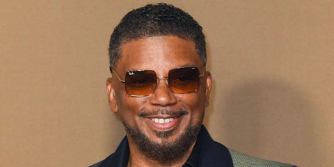 Actor Carl Anthony Payne II was seen wearing gold Ray-Ban Square RB 1971 9147/51 sunglasses with brown gradient lenses at BET Awards 2026.
