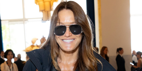 Carla Bruni was seen wearing silver Saint Laurent Sun SL 653 Leon 001  aviator sunglasses as she checked in to The Hotel Martinez during Cannes Film Festival.