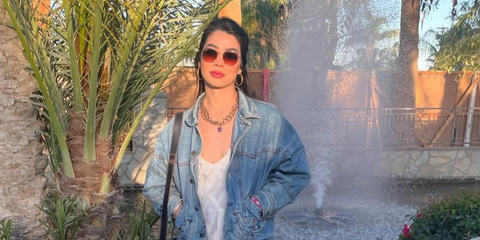 Actress Caroline Kwan was seen wearing Ray-Ban Hexagonal RB 3548N 9069/A5 sunglasses with pink to brown gradient lenses in her Instagram post, February 2025.