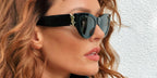 French entrepreneur and television personality Caroline Receveur was seen wearing black Saint Laurent Sun SL M94 001 cat eye sunglasses in a social media post