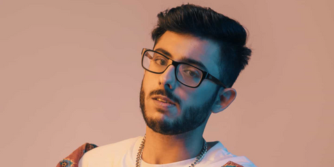 Indian YouTuber and content creator Ajey Nagar, widely known as CarryMinati, was seen wearing black Ray-Ban RB 5268 5119 rectangular optical glasses in 2020.