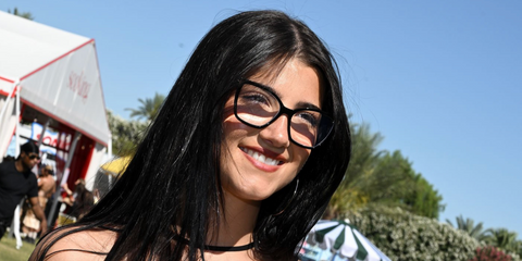 Charli D'Amelio was seen wearing black Tom Ford TF5812-B 001 cat eye optical glasses with clear Blue Control lenses at the Revolve Festival 2026 during Coachella weekend.