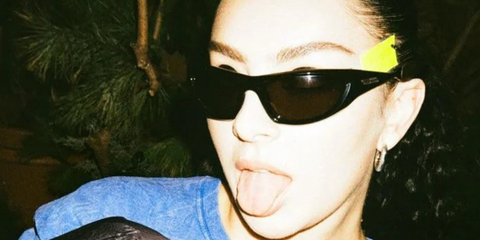 Charli XCX wears Bottega Veneta black sunglasses - buy online.