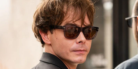 Charlie Heaton was seen wearing tortoise Serengeti Foyt SS549002 sunglasses with orange lenses.