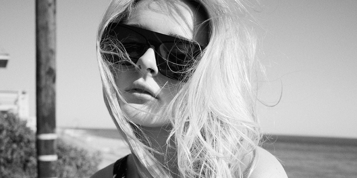 Charlotte Lawrence is seen wearing Saint Laurent Sun SL 651 Vitti 001 sunglasses in a fashion editorial for contentmode.com