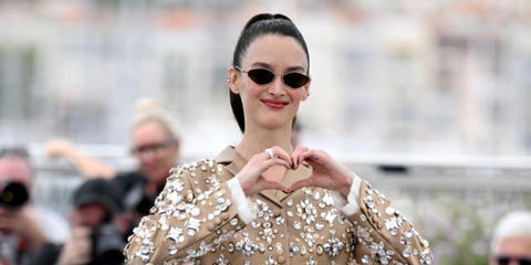 Charlotte Le Bon was seen wearing metal Miu Miu MU 56ZS 5AK09Z sunglasses to attend the "Niki" photo call during Cannes FIlm Festival 2024