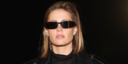 Belgian DJ and record producer Charlotte de Witte wore black Saint Laurent Sun SL 963 001 shield sunglasses at the Saint Laurent Spring Summer 2027 show during Paris Fashion Week.