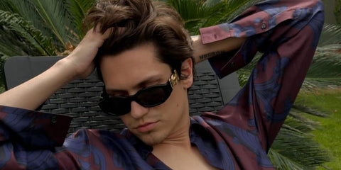 Chase Hudson was seen wearing black Versace 4361 GB1/87 Medusa Biggie Sunglasses in his Instagram post, April 2025.