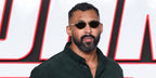 Mixed martial artist and actor Chi Lewis-Parry was seen wearing gold Ray-Ban RB 3774D 001/73 oval sunglasses with brown lenses at the UK premiere of The Running Man, November 2025. Shop online now on Pretavoir