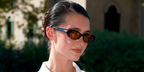 Musician Chiara King wore tortoise Miu Miu MU C05SU 23A91C sunglasses with pink brown lenses at the 83rd Venice Film Festival, September 2026.