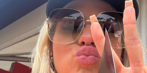 Television personality Chloe Burrows of Love Island (2021) was seen wearing gold Gucci GG0879S 002 sunglasses in her Instagram post, July 2023.