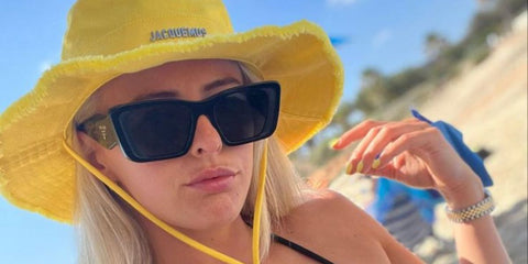 Footballer Chloe Kelly of Arsenal FC was seen wearing black Prada PR 08YS 1AB5S0 Symbole Sunglasses. Shop online now on Pretavoir