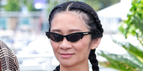Filmmaker Chloe Zhao was seen wearing black Bottega Veneta BV1431S 001 cat eye sunglasses at the Cannes Film Festival 2026 Jury Photocall