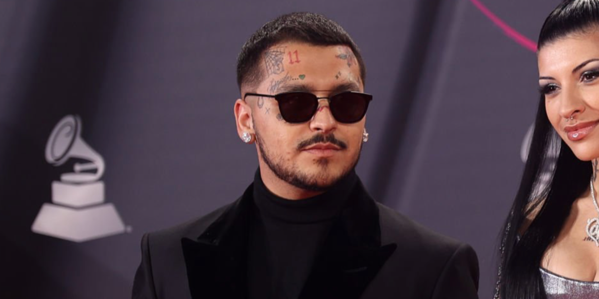 Mexican singer Christian Nodal was seen wearing black Saint Laurent Sun SL 28 Metal 001 sunglasses at the Latin Grammy Awards 2022.