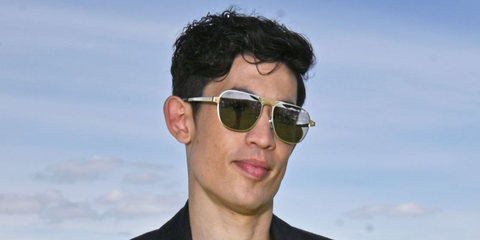 Australian actor Christopher Chung was seen wearing gold and silver Cartier Santos CT0532S 001 sunglasses with grey lenses at the Cartier Queen's Polo Cup 2026 in Egham, England.