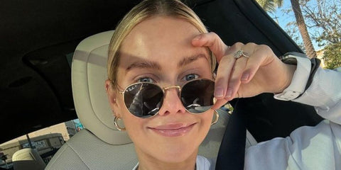 Claire Holt was seen wearing Ray-Ban Round Metal RB 3447 9196/48 Polarised sunglasses in a social media post