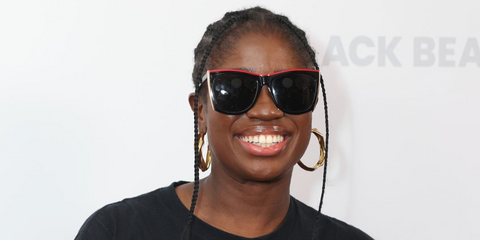 Clara Amfo was seen wearing black, red, and gold Saint Laurent SL 539 Paloma 001 sunglasses at "The Invite" UK special screening in July 2026
