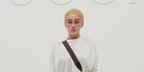 Singer-songwriter Claudia Valentina wore Gucci GG2177S 009 sunglasses with pink lenses at the Gucci Spring/Summer 2027 show during Milan Fashion Week.
