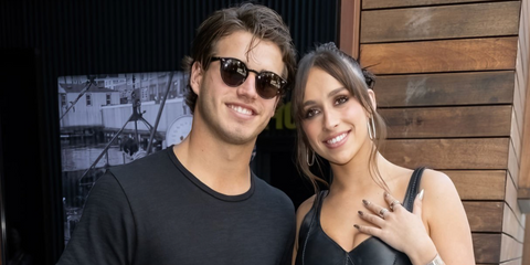 Professional ice hockey player Cole Sillinger, pictured with ex-girlfriend Tate MacRae was seen wearing dark tortoiseshell Ray-Ban 2180 710/73 Round sunglasses at the Jason Wu Spring/Summer 2023 fashion show during New York Fashion Week.