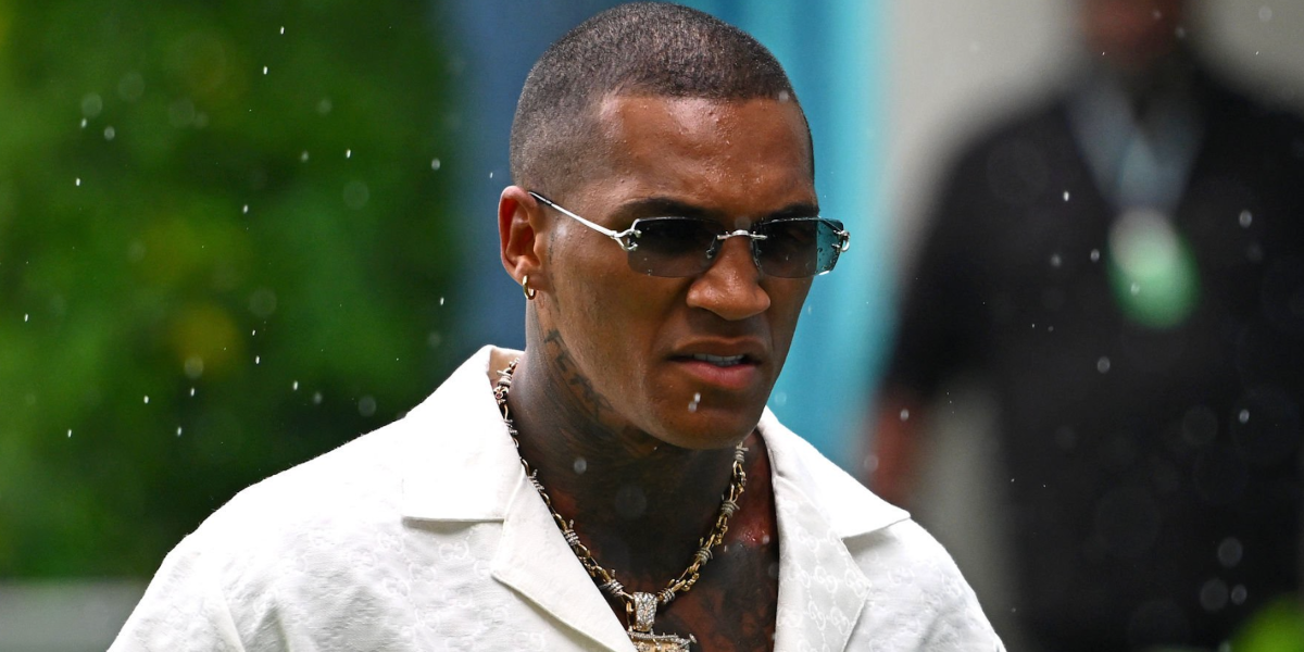Professional boxer Conor Benn was seen wearing silver Cartier CT0563S 001 Blue & Beyond sunglasses with clear to blue photochromic lenses at the F1 Miami Grand Prix 2025